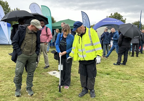 Visitors detecting leaks at new leak detection field