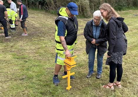 Visitors detecting leaks at new leak detection field